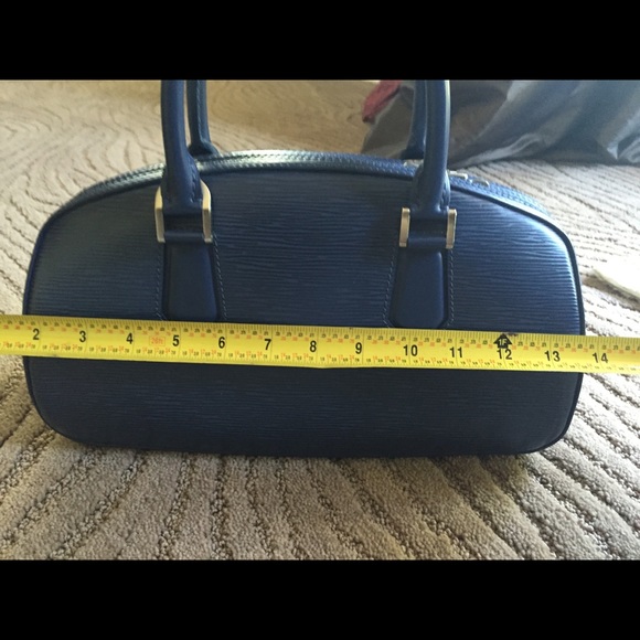 This LV purse is great for crossbody or with the handle. Looks brand new. - Picture 3 of 5